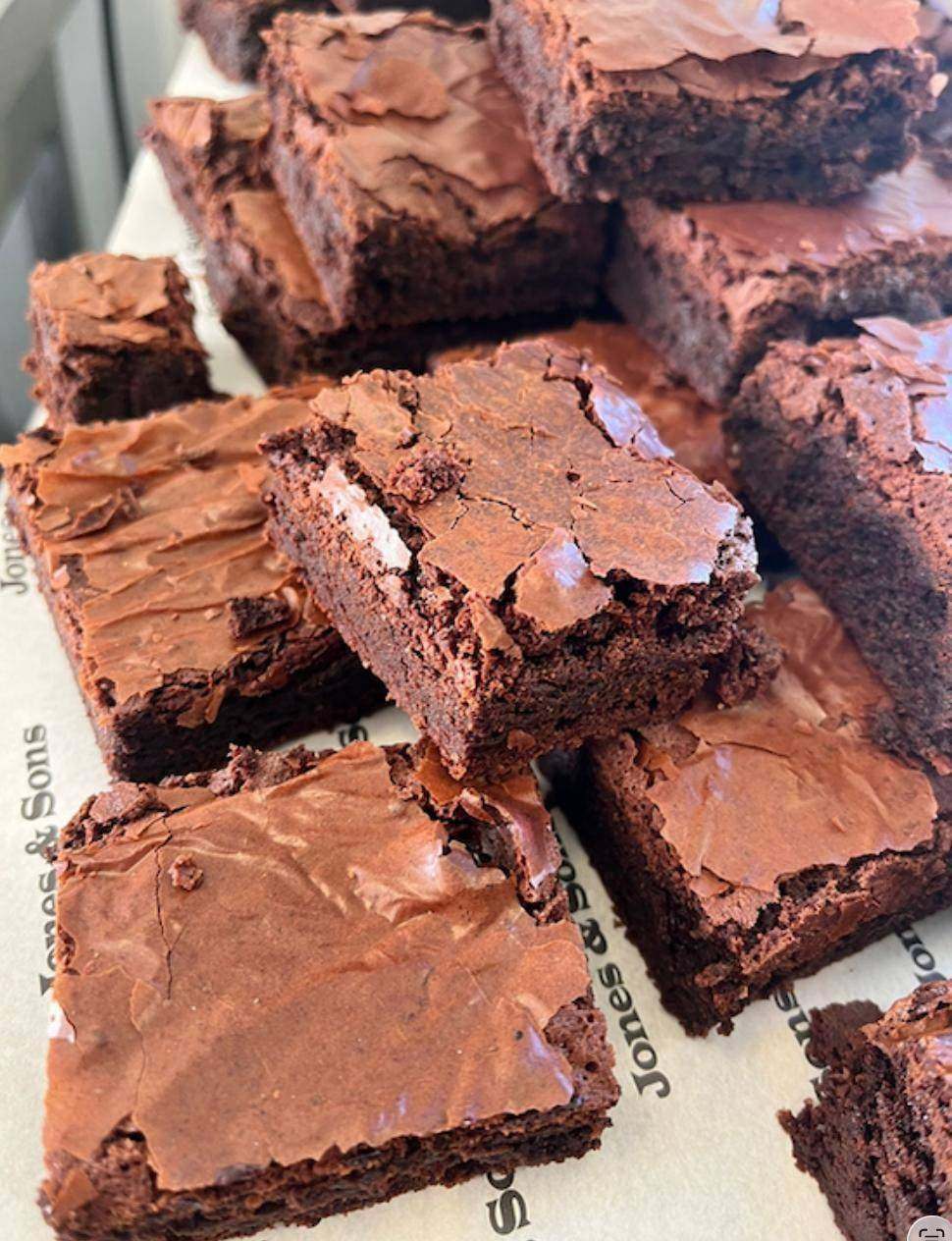 Close-up of chocolate brownies on Jones & Sons paper