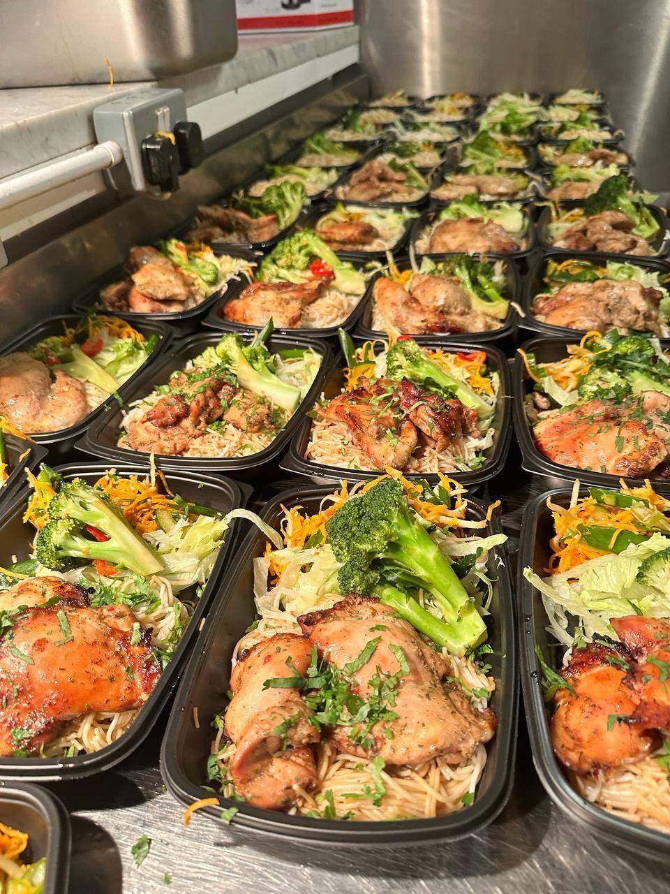 Rows of packed individual chicken meals ready for dispatch